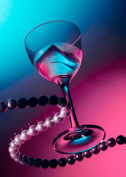 Floating cocktail glass with pearls.