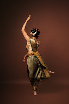 Bharatanatyam dancer performing traditional indian classical dance