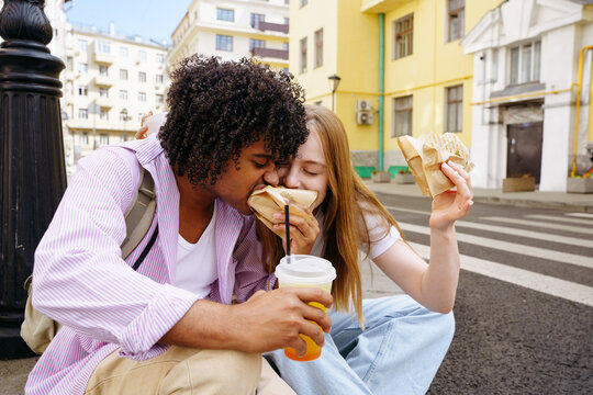 Tourists enjoying street food in city