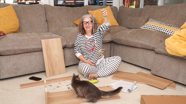 Woman Assembling Furniture