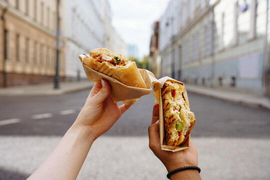 Tourists enjoying street food in city