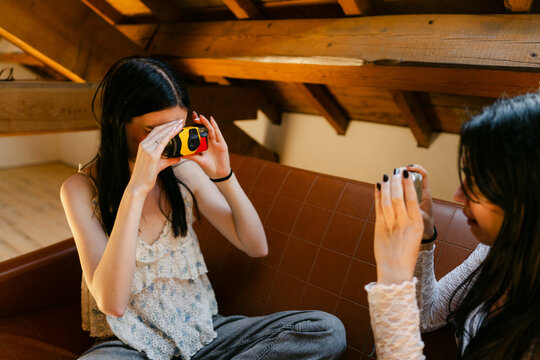 young women having fun, taking selfies 