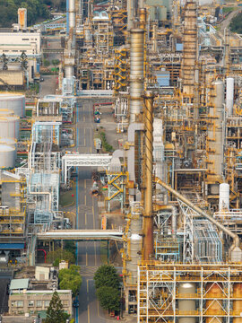 Close Up of Petrochemical Refinery Towers and Pipelines