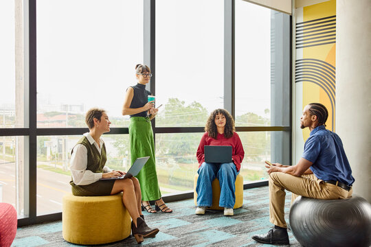 Business Team Members Discuss Ideas in Modern Office Space