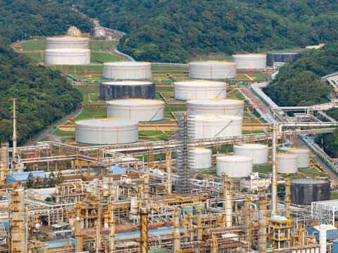 Aerial view of a petrochemical refinery with oil storage tanks a