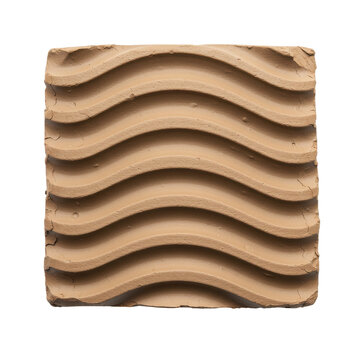 Textured clay tile with undulating wave pattern isolated on white background