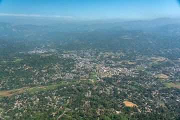 Fototapeta premium Panoramic mountain view of a jungle town