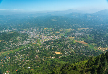 Fototapeta premium Panoramic mountain view of a jungle town