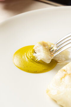 Fish dipped in sauce
