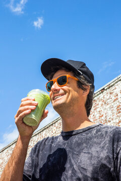 Smiling Drinking Matcha in Los Angeles