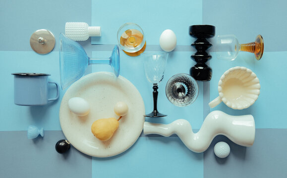 Arrangement of various objects on a light blue surface