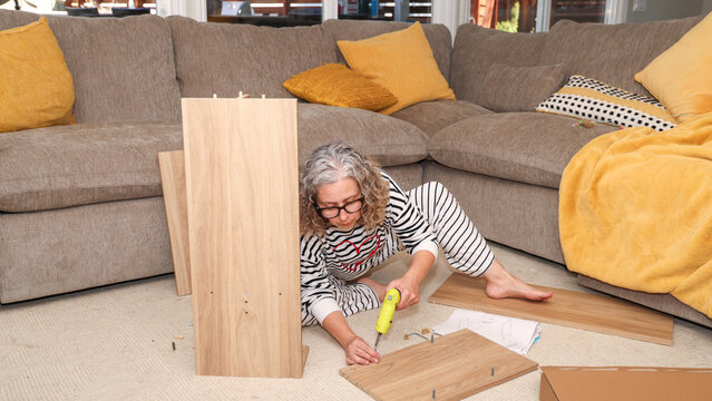 Woman Assembling Furniture