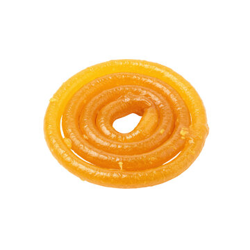 Golden spiral jalebi a delicious indian sweet treat close up view isolated on white background