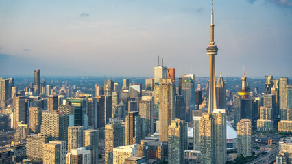 Naklejka premium Helicopter Perspective. Toronto Skyline Bathed in Sunset Glow