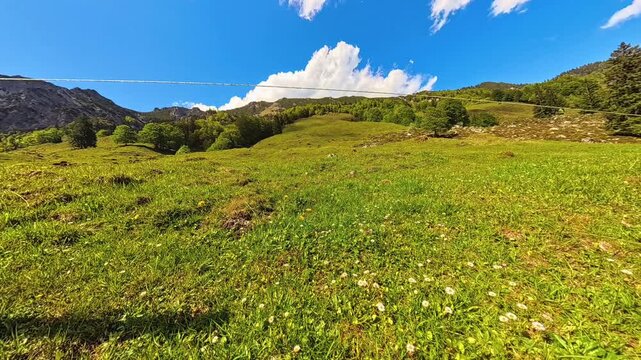 4K Timelapse alpine video with moving clouds at Kaiserbachtal valley, Griesenau, Wilder Kaiser, Kitzbuehel, Tyrol, Austria