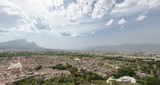 Majestic aerial shot of Pompeii archaeological site during sunny summer day