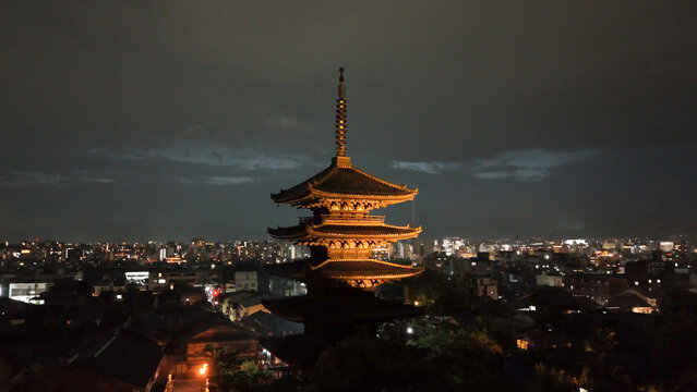 Kyoto&rsquo;s ancient Yasaka Pagoda seen from above under soft night illumination
