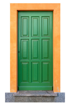 Green wooden door with nine rectangular rusticated panels set orange plaster frame, resting on gray stone threshold. isolated