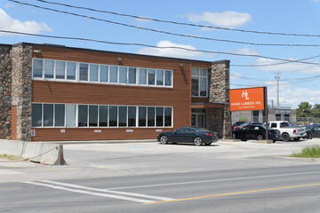 Fototapeta premium exterior building facade and sign of Home Lumber Inc located at 714 Birchmount Rd, Scarborough, Toronto