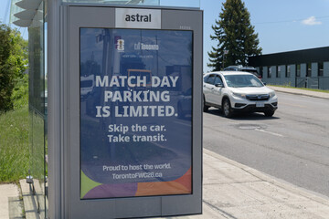 Obraz premium Astral Media out-of-home bus shelter advertising poster for host city FIFA World Cup re: match day parking, Birchmount Rd, Scarborough, Toronto