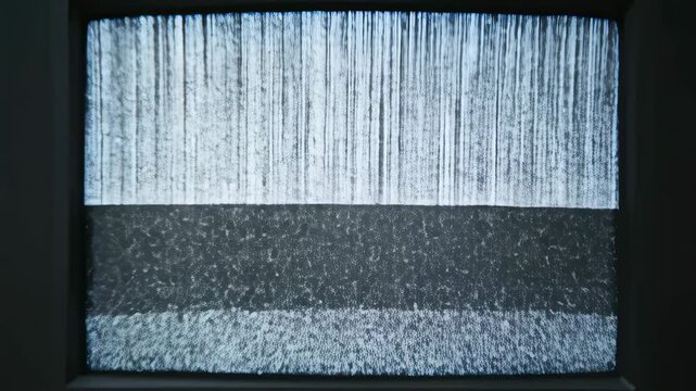 Retro analog tv static transitioning through varying patterns