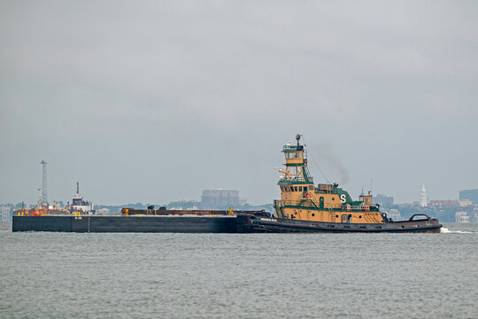 Tugboat Patricia Jean positions a barge in Charleston Harbor, SC, USA on June 02, 2026.
