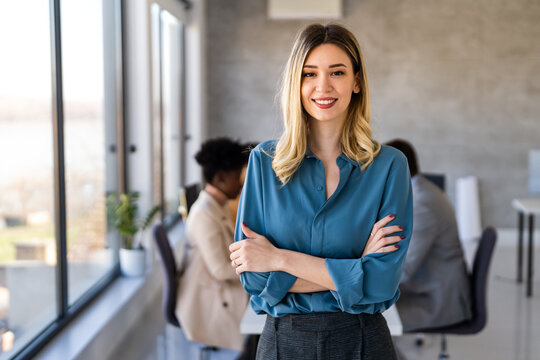 Confident business woman in modern office showcasing executive leadership, professional success