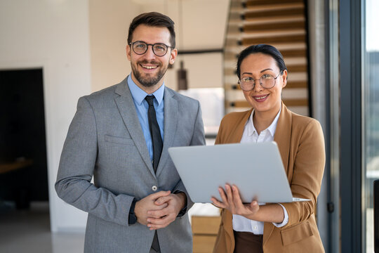 Multicultural business professionals in office, teamwork to achieve corporate success together