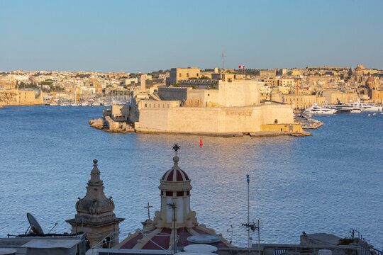 View of Fort Saint Angelo in Grand Harbour with the waterfront of Birgu in the background.