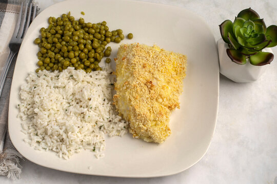baked cod  with peas and seasoned rice