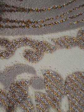 Ornate Fabric Texture with Metallic Gold and Silver Thread