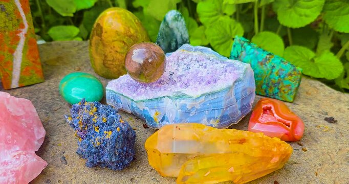 
Crystals and natural minerals lie in green grass. Yoga concept
