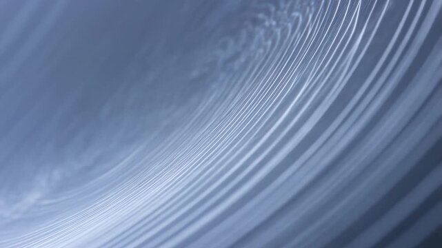 Dynamic ripples in motion: abstract patterns in subtle blue tones