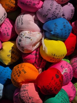 Colorful Kukurizaru prayer balls at Yasaka Koshin-do Temple Kyoto