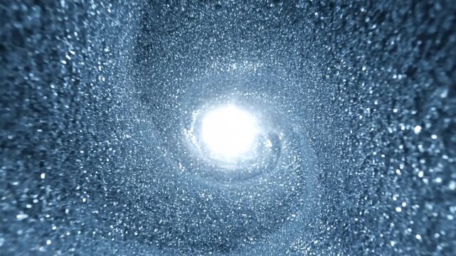 Slow motion tracking shot of shimmering particles spiraling into bright light inside glittering tunnel vortex interior with bokeh sparkle and metallic reflections