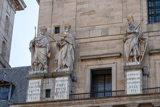San Lorenzo de El Escorial, Spain. Statues of Josaphat, Ezechias and David by Juan Bautista Monegro on the basilica facade, with Latin inscriptions on marble tablets below each figure