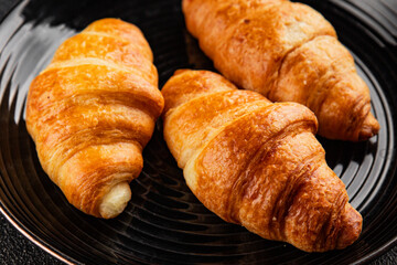 Croissants fresh pastries, fluffy treats tasty snack delicious gourmet food, background on the table rustic food, top view copy space © Alesia Berlezova