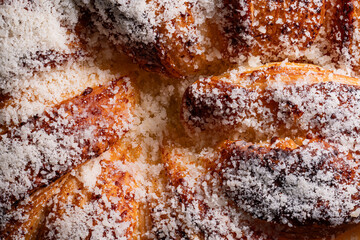 Fototapeta premium High-Resolution macro texture of sweet pastry bread with powdered sugar, extreme detail
