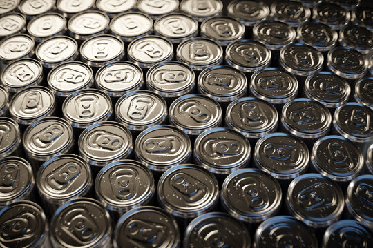 3D Rendering of many glossy aluminium cans from above