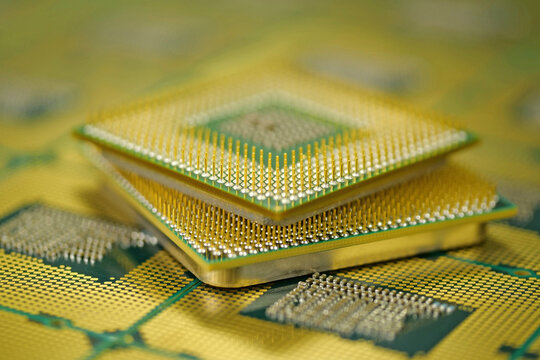 CPU photographed from top showing micro pins ready to connect with motherboard