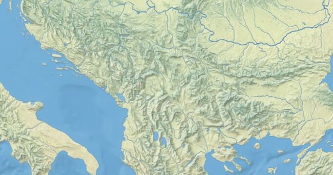 Kosovo on Globe. Zoom into the country with Earth spinning on dark background. Physical world map with Kosovo and label on it. Country view animation.