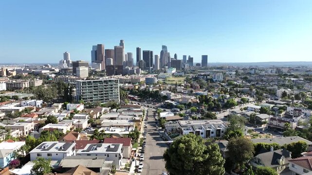 Los Angeles, California, USA - Aerial Drone View of Downtown Los Angeles Skyline and High-Rise Commercial Buildings Rising Above Residential Neighborhoods Near Everett Park, Echo Park on a Sunny Day