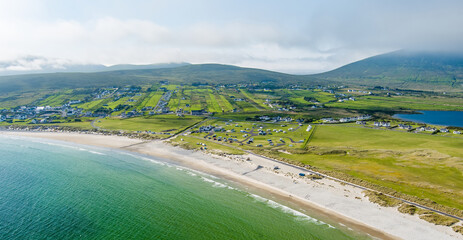 Fototapeta premium Aerial view of Keel Beach on Achill Island, County Mayo, Ireland. Turquoise Atlantic water, white sand and low cloud along the Wild Atlantic Way.