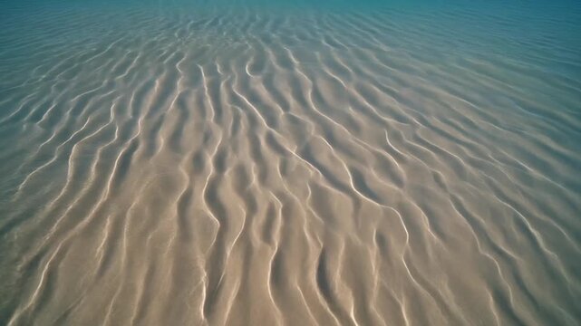 Waves on Sandy Beach Surface.