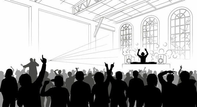 People raising hands in concert audience.