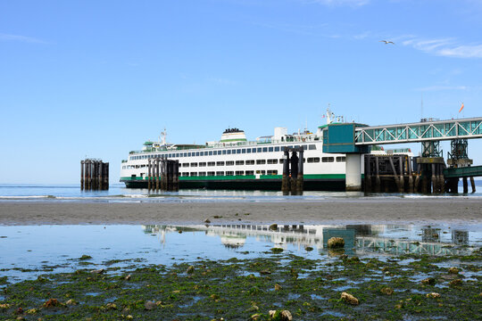 Edmonds, WA, USA - May 21, 2026; Washington State car and passenger ferry MV Walla Walla docked at Edmonds with beach reflection