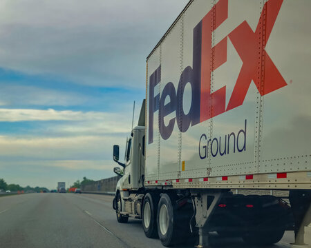A FedEx Ground semi-truck traveling on a highway on May 16, 2026. For Editorial Use Only.