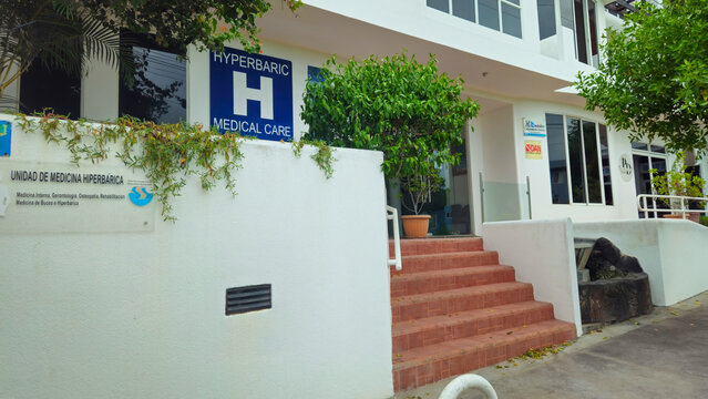 Puerto Ayora, Galapagos Islands, Ecuador - May 22, 2026: Exterior view of a professional hyperbaric medical care clinic. Editorial Use Only.