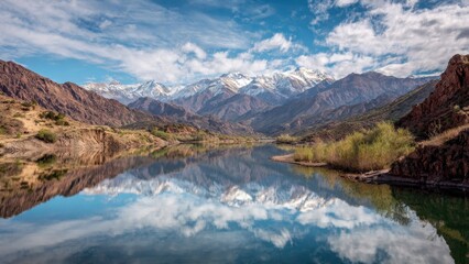 Naklejka premium Mountain Reflection in Serene River Valley