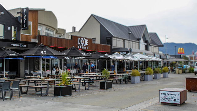 Taupo, New Zealand - Mar 10, 2026: Vibrant lakefront dining establishments situated along Roberts Street in downtown. Editorial Use Only.